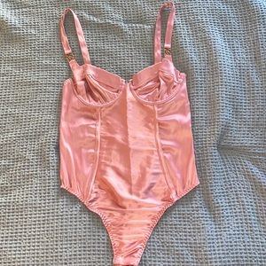 Pink Victoria Secret Bodysuit.Size:Small.